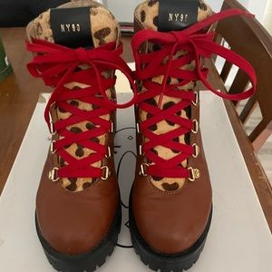 Brown combat boots with red laces and cheetah print. #SteveMadden